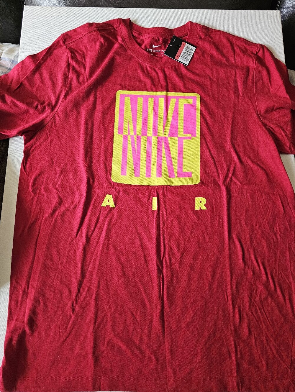 Nike Men’s Red Short Sleeve Tee with Yellow Graphic